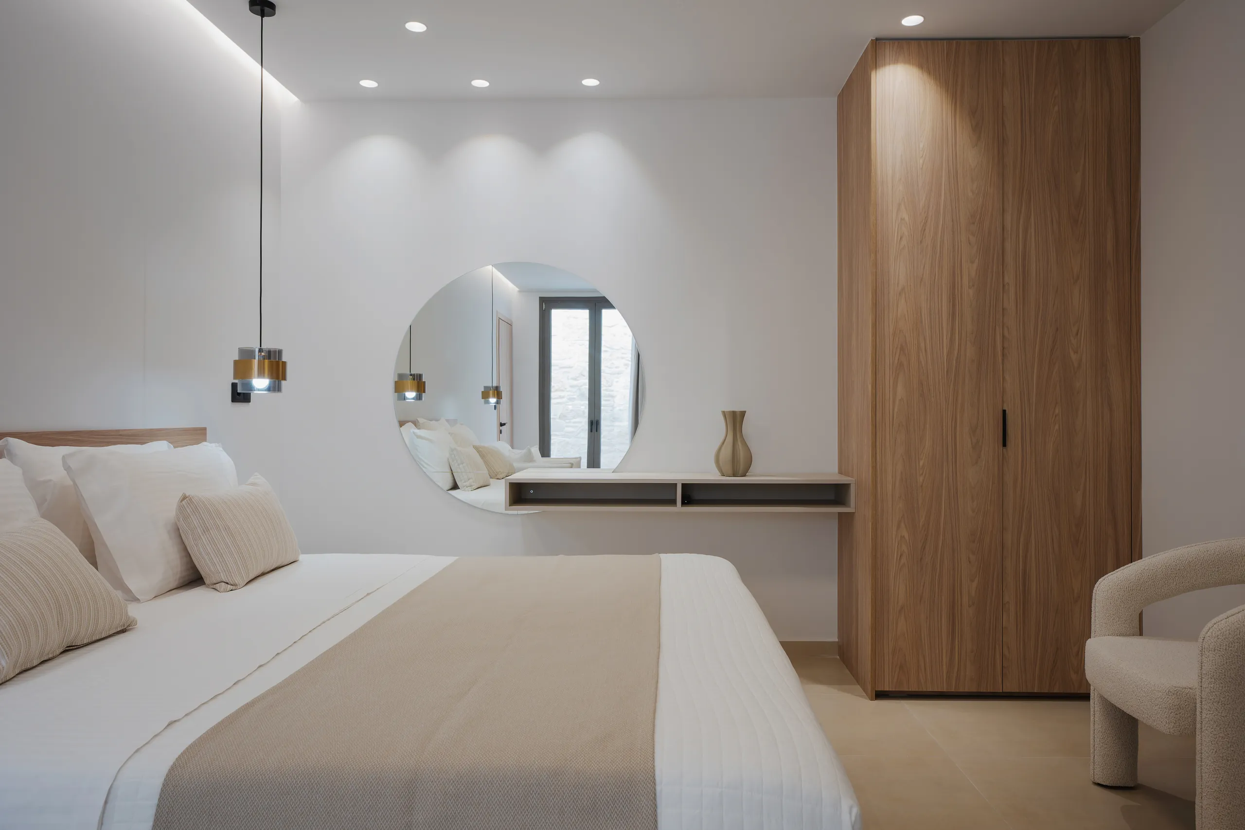 Left Crete bedroom two with natural timber joinery