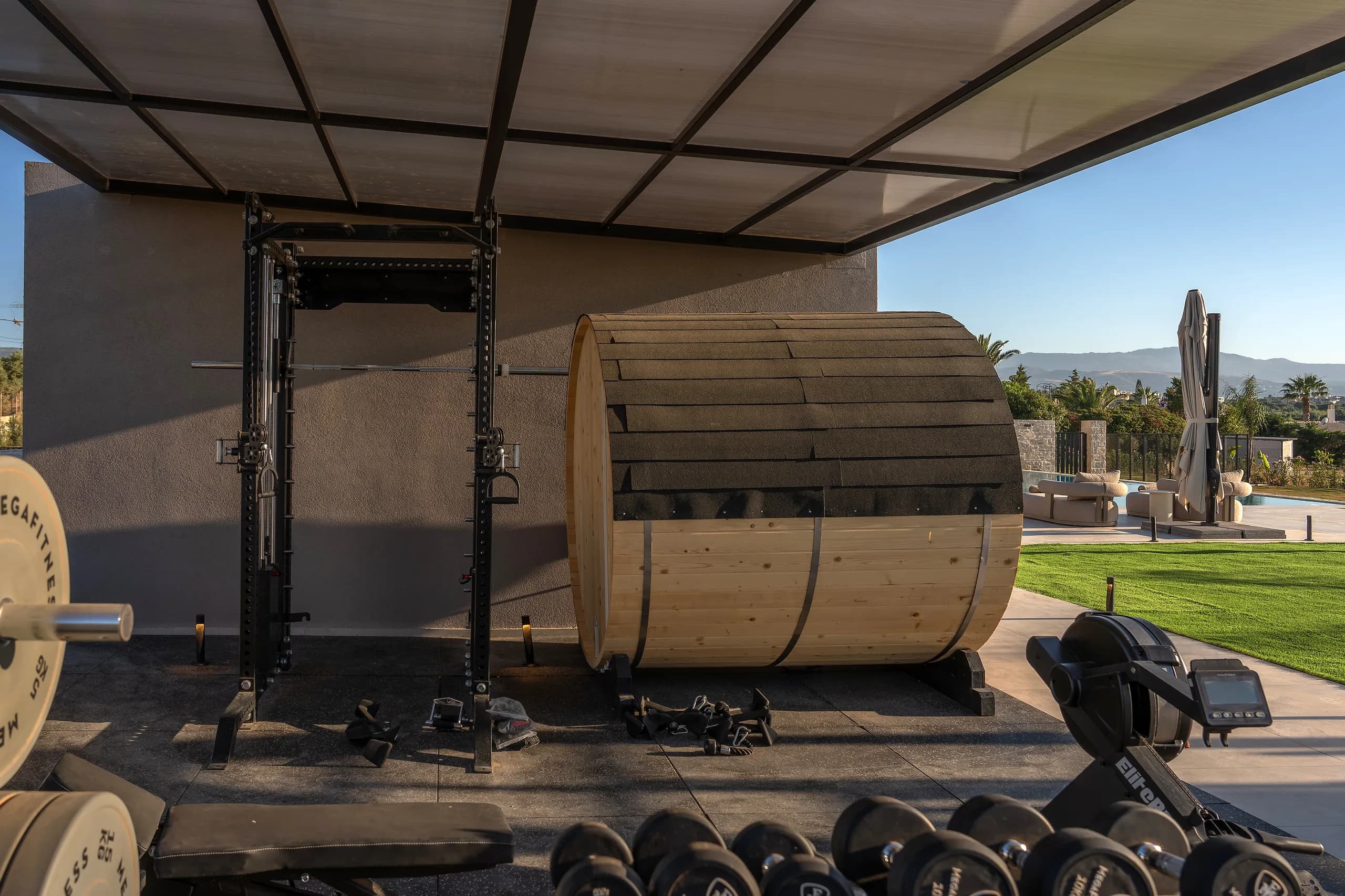 Right Crete's outdoor gym and sauna overlooking the pool garden